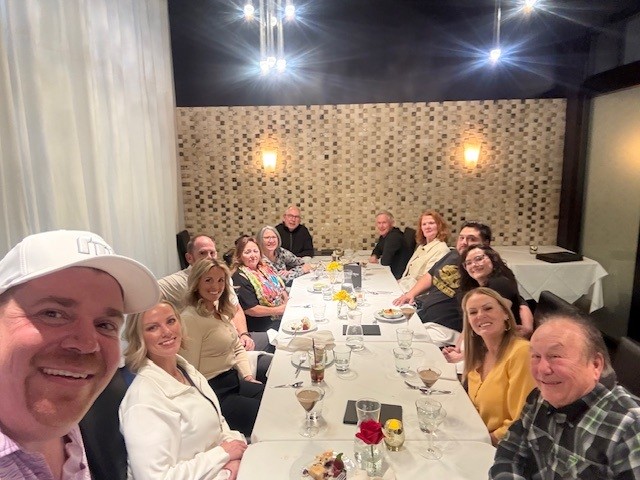 The Brandol + Associates team at dinner after tax season